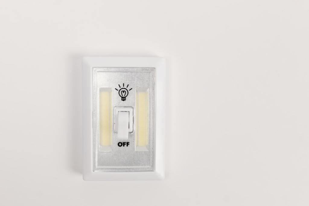 Sustainability Turned Off Light Switch on Wall